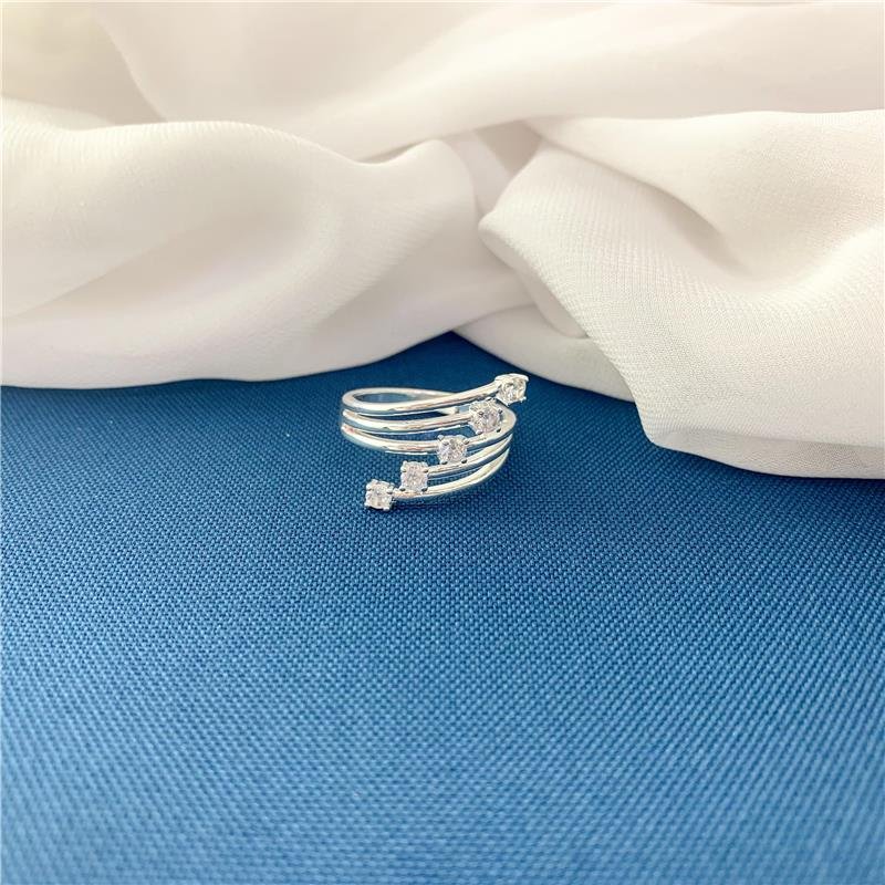 ANEL DETALHE TRÊS AROS COM PEDRAS - CRISTAL