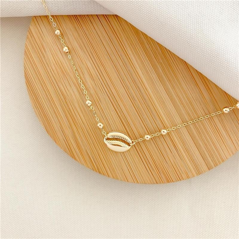 CHOKER ELOS BOLINHA BÚZIO