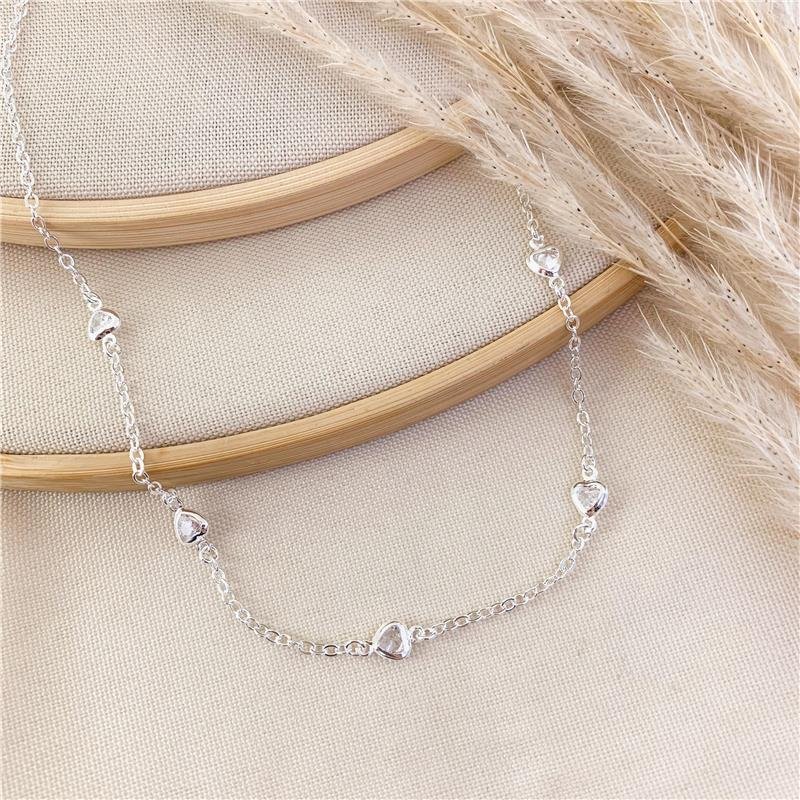 CHOKER ELOS COM PINGENTES DE CORAÇÃO - CRISTAL