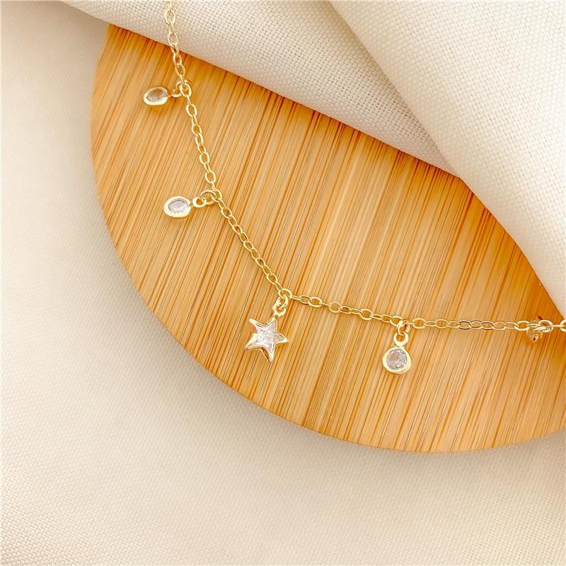CHOKER ELOS ESTRELA E PONTO DE LUZ