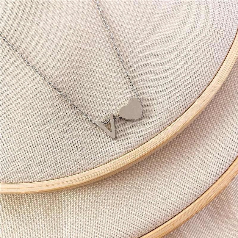 GARGANTILHA ELOS CORAÇÃO LETRA