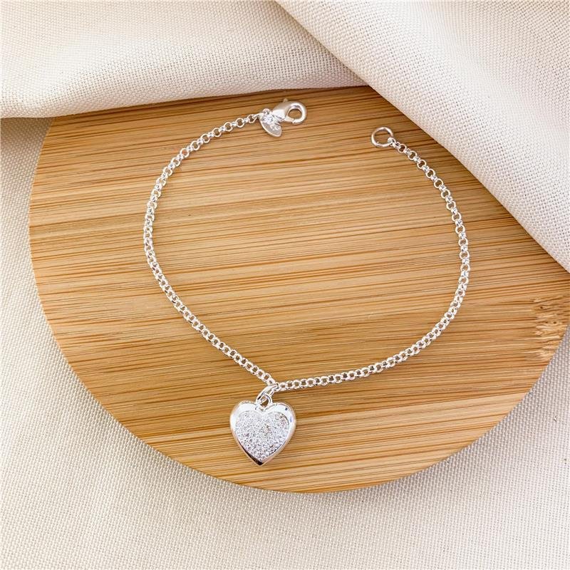 PULSEIRA COM PINGENTE CORAÇÃO - CRISTAL