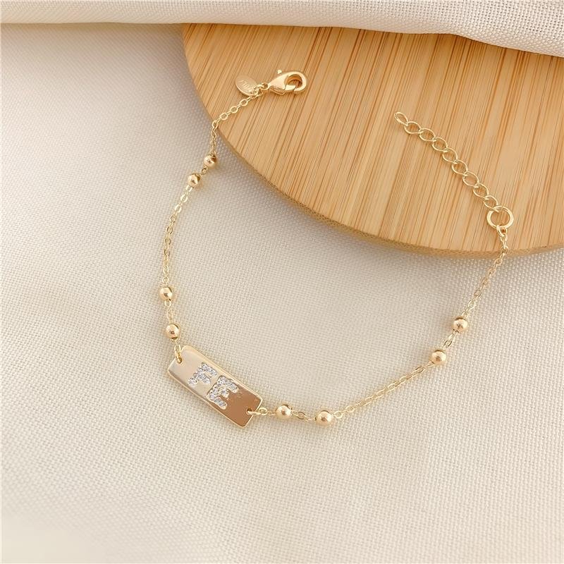 PULSEIRA ELOS BOLINHA PLACA FÉ - CRISTAL