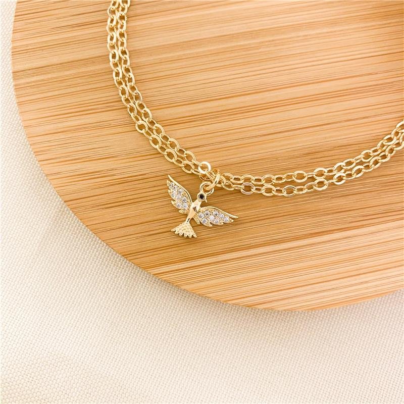 PULSEIRA DUPLA ELOS COM PINGENTE ESPÍRITO SANTO