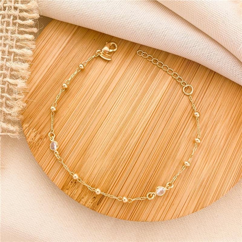 PULSEIRA ELOS CARTIER BOLINHA E PONTO DE LUZ - CRISTAL