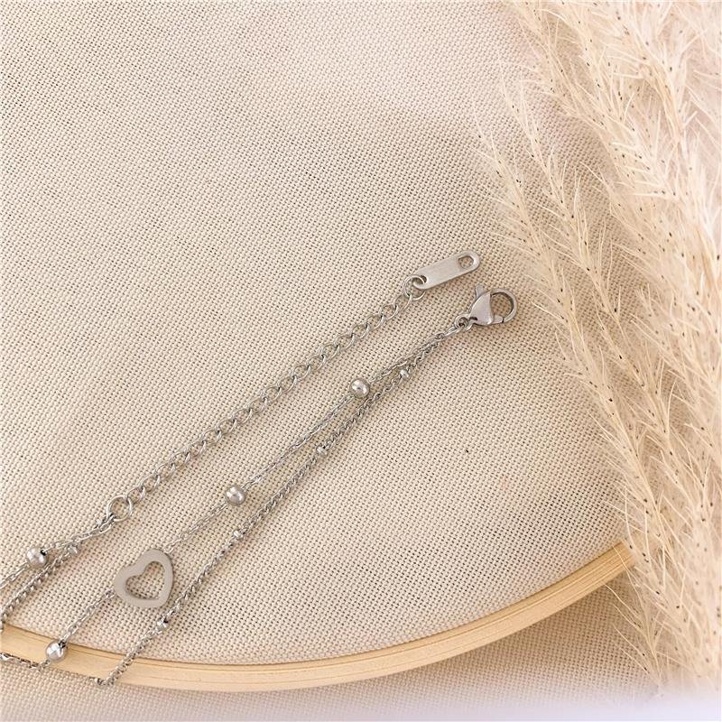 PULSEIRA DUPLA ELOS BOLINHA CORAÇÃO-AÇO INOX