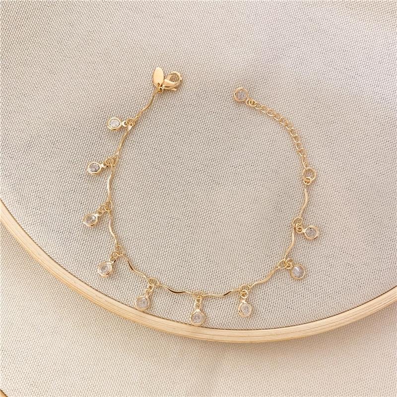 PULSEIRA FILETE COM PONTO DE LUZ - CRISTAL