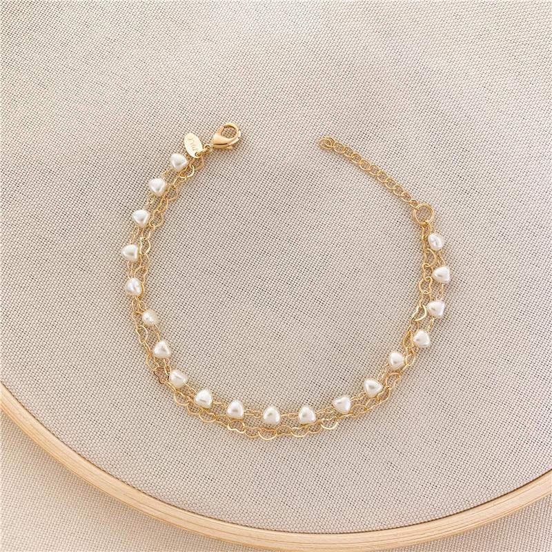 PULSEIRA DUPLA ELOS CORAÇÃO E PÉROLA