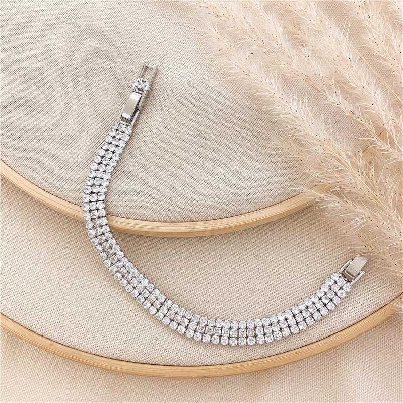 PULSEIRA RIVIERA TRÊS FILEIRAS CRAVEJADO-BANHO EM RÓDIO BRANCO - CRISTAL
