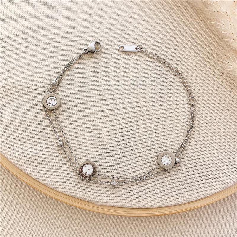 PULSEIRA DUPLA ELOS BOLINHA E PEDRINHAS - CRISTAL