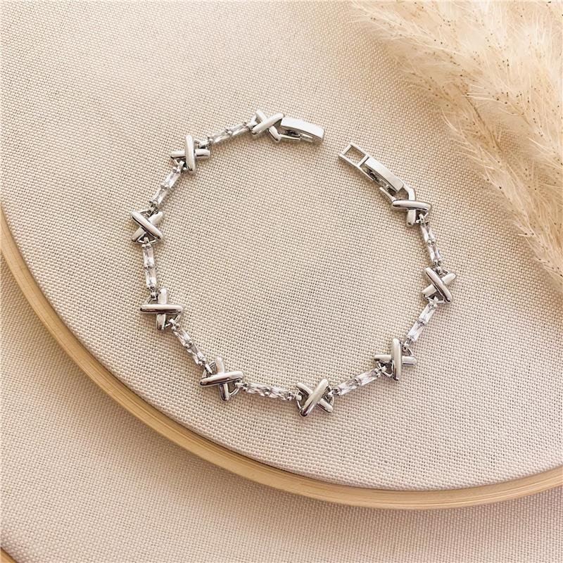 PULSEIRA RIVIERA DETALHE EM X - CRISTAL