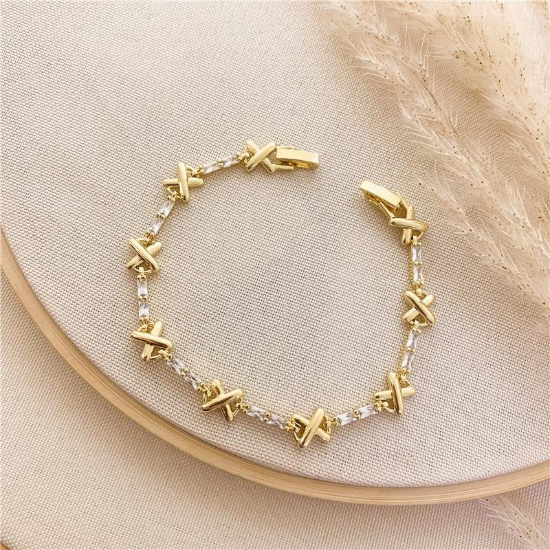 PULSEIRA RIVIERA DETALHE EM X - CRISTAL