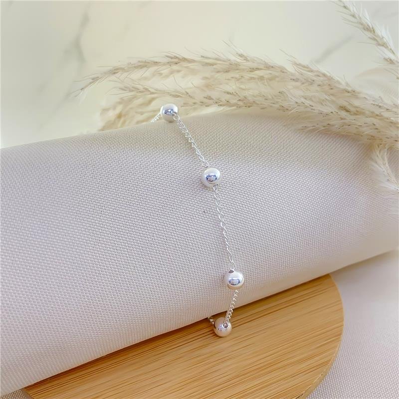 PULSEIRA BOLINHA LISA/6MM BANHADO A PRATA