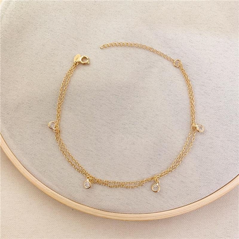 TORNOZELEIRA DUPLA ELOS PONTO DE LUZ - CRISTAL