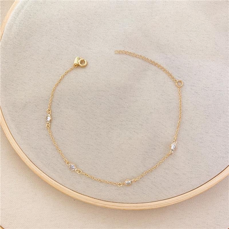 TORNOZELEIRA ELOS PONTO DE LUZ - CRISTAL